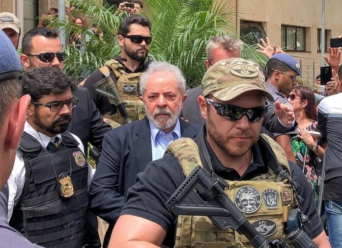 Brazil's former President Luiz Inacio Lula da Silva, leaves for the cemetery to attend the funeral of his 7-year-old grandson, in Sao Bernardo do Campo