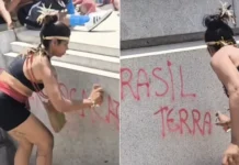 Mulher responde por dano ao patrimônio após pichar monumento durante protesto