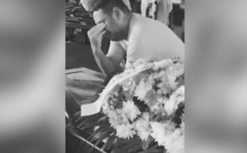 Pai chora durante velório de vítima de naufrágio no AM